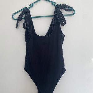 Black bodysuit with bow ties at shoulder